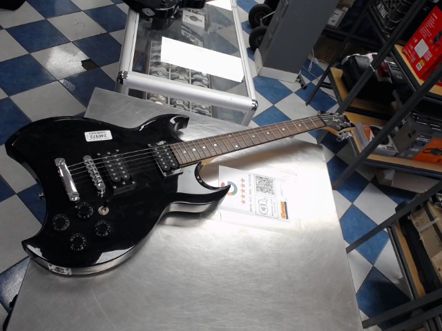 Guitare electrique en pique