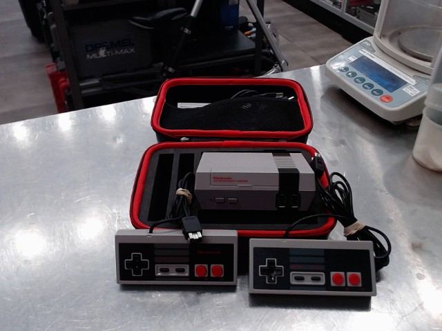 Console nintendo classique + acc/2man.