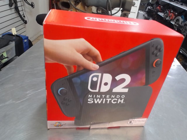 Switch 2 + acc dans boite complet