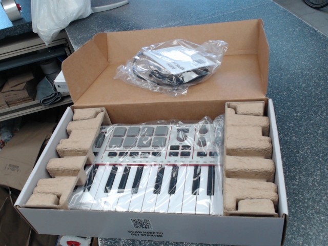 Compact keyboard/pad controller