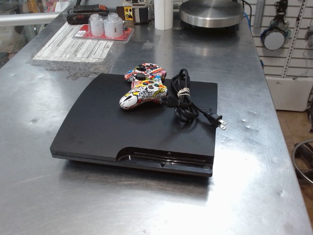 Ps3 + charg + manette + acc