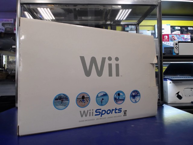 Console +accessoires en boite