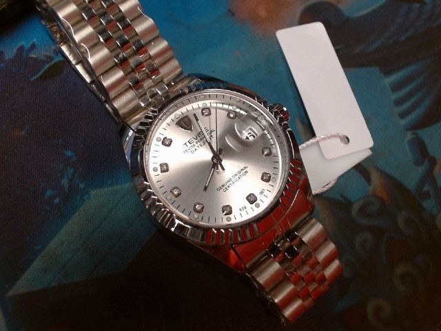 Montre tevise avec tag