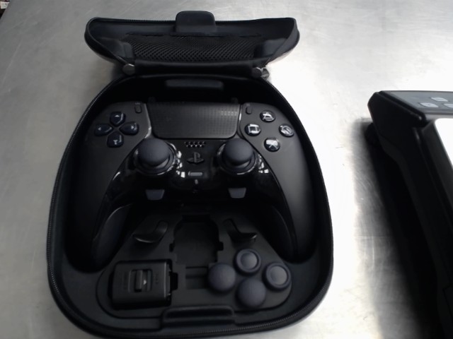 Mannette edge ps5 dans sa box + acc