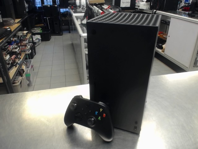 Console xbox series x avec mannete