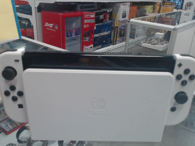 Nintendo switch oled + dock +  fils
