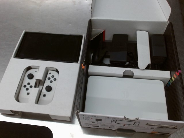 Nintendo switch oled avec tout