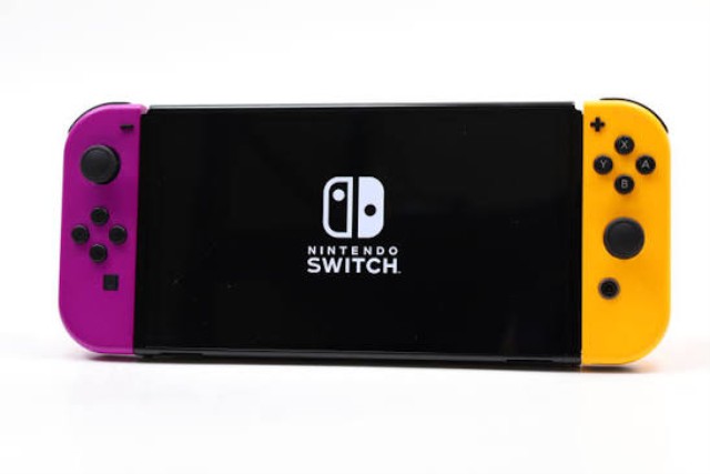 Nintendo switch oled purple orange