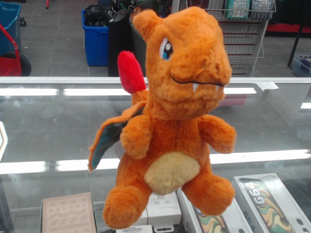 Peluche pokemon dracaufeu