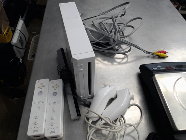 Console nintendo wii+manette +fil