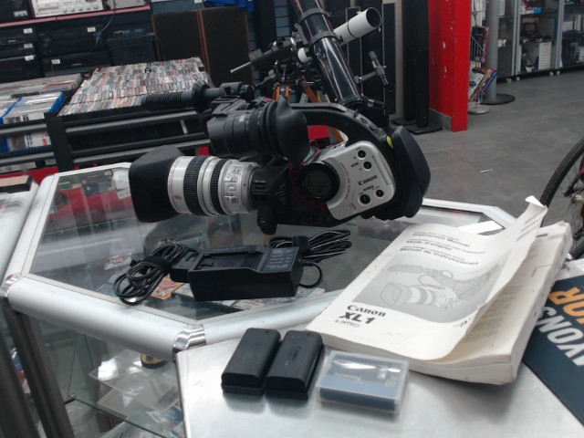 Canon camcorder +manuel + batt