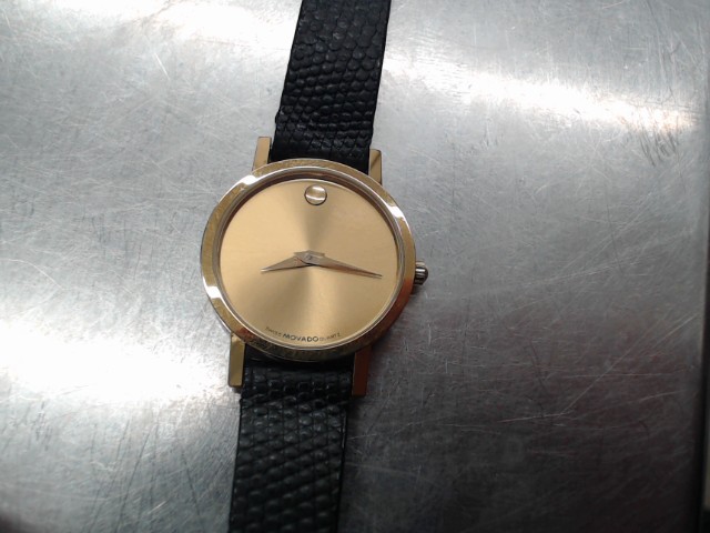 Petite montre noire et dor�e