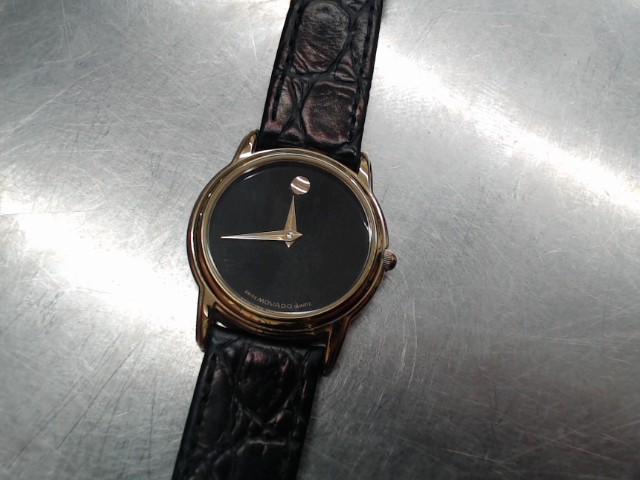 Petite montre noire et dor�e
