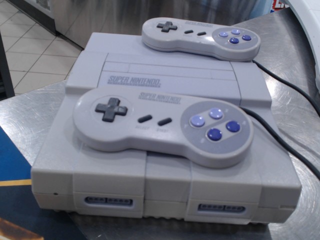 Console sness et 2 manettes