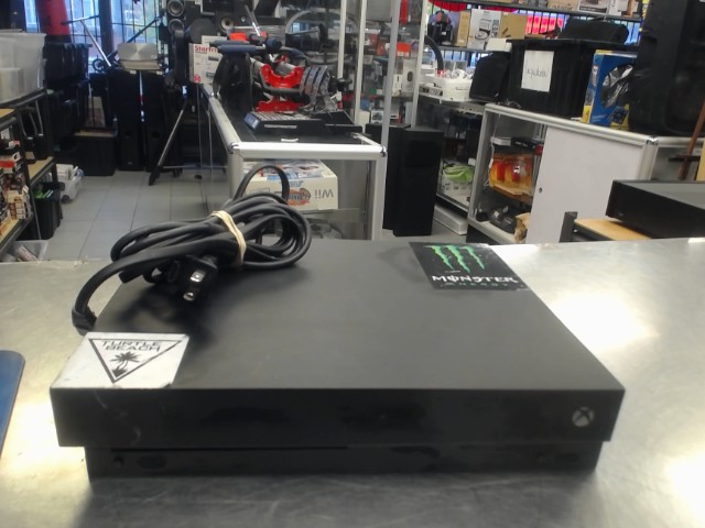 Xbox one x + fils ( no controller)