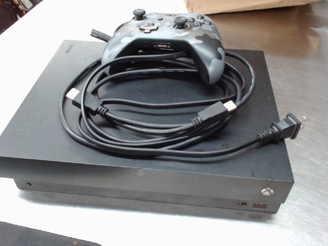 Xbox one x avec manette fil