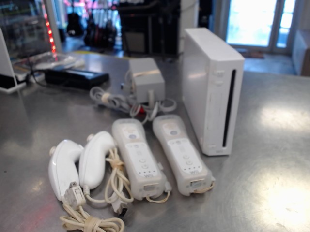 Console nintendo wii +2 mans+fils(nocap)