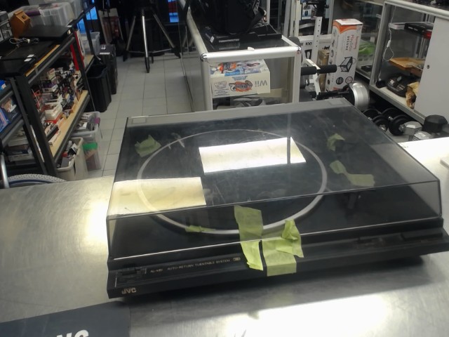 Auto-return turn table system