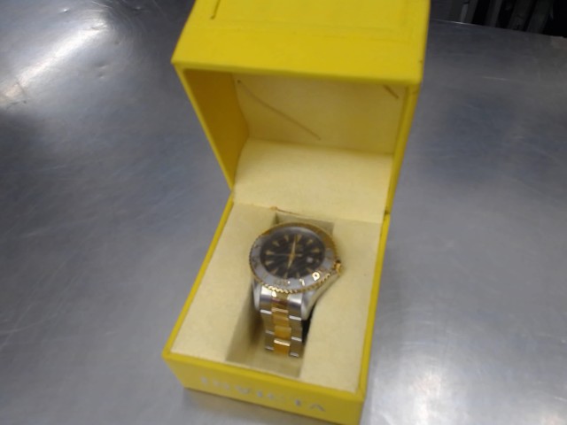 Montre invita dans boite jaune