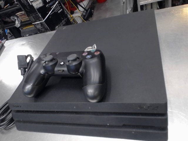 Console ps4 pro + man + fil