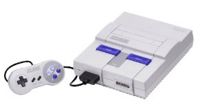 Super nintendo avec 2 manettes