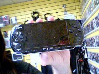 Psp grise +9 jeux+batt+fill+case
