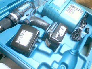 Perceuse marteau + batterie