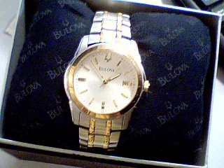 Montre bulova dore et silver