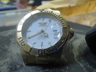 Montre dore invicta cadran noir