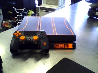 Console + manette dans boite