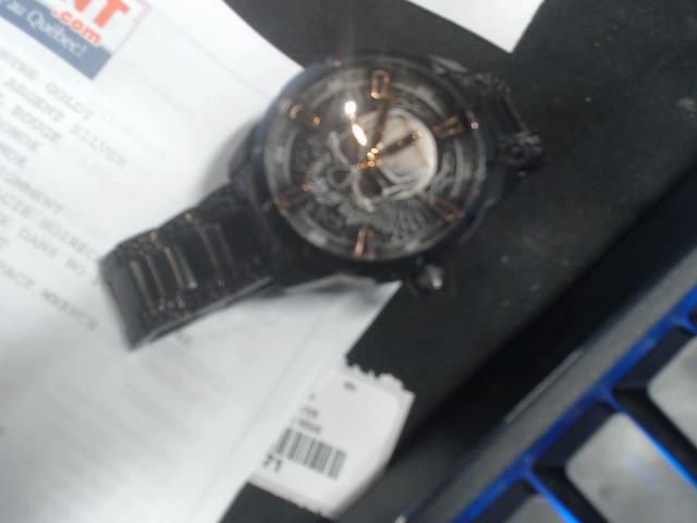 Montre police tete de mort comme neuf