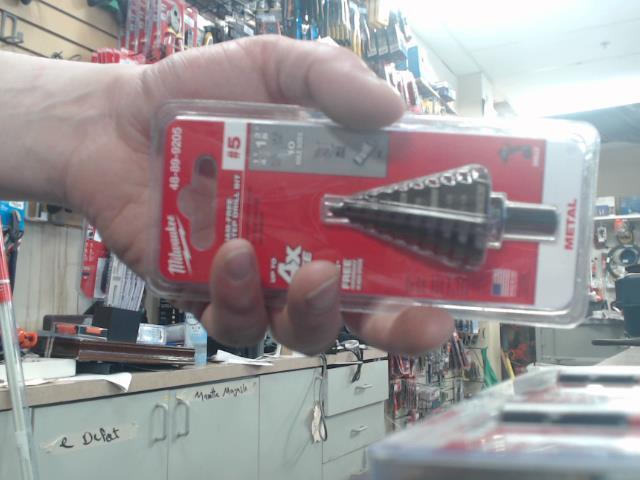 Jam-free step drill bit #5